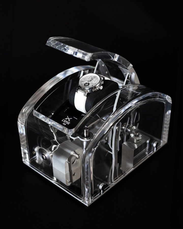 Designed in collaboration with Winston Chapman, the Watch Box springs to life at the press of a button, when a mechanical system opens the box at the same time as it lifts the wristwatch.